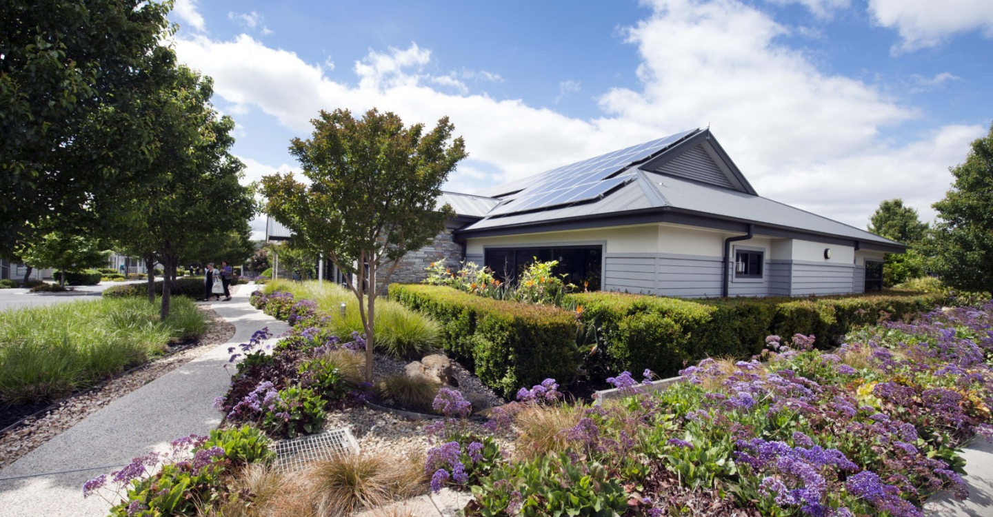 Lifestyle Communities Clubhouse Streetscape Flowers
