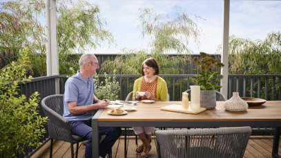 Mount Duneed Couple enjoying breakfast on deck