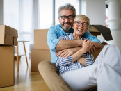 Couple Packing Boxes Moving Downsizing Clutter Removal Removalist