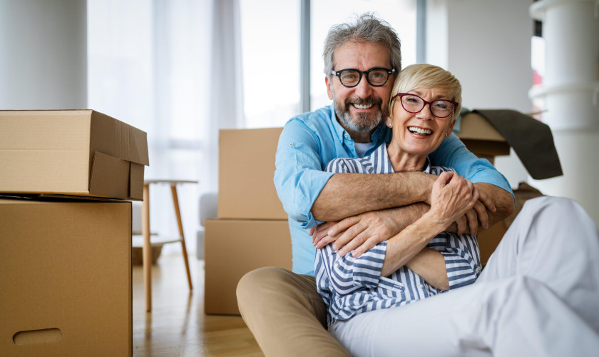 Couple Packing Boxes Moving Downsizing Clutter Removal Removalist