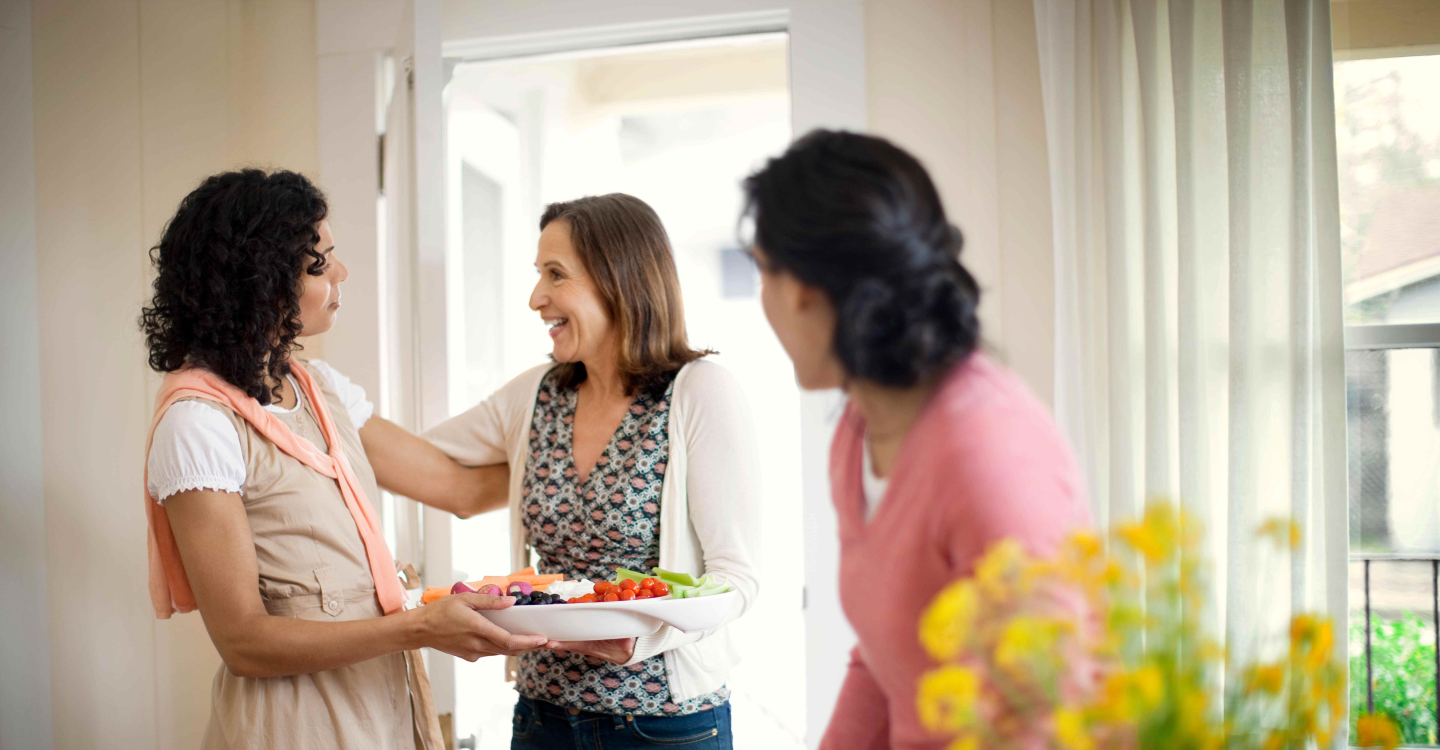 Neighbours friends family women visit home