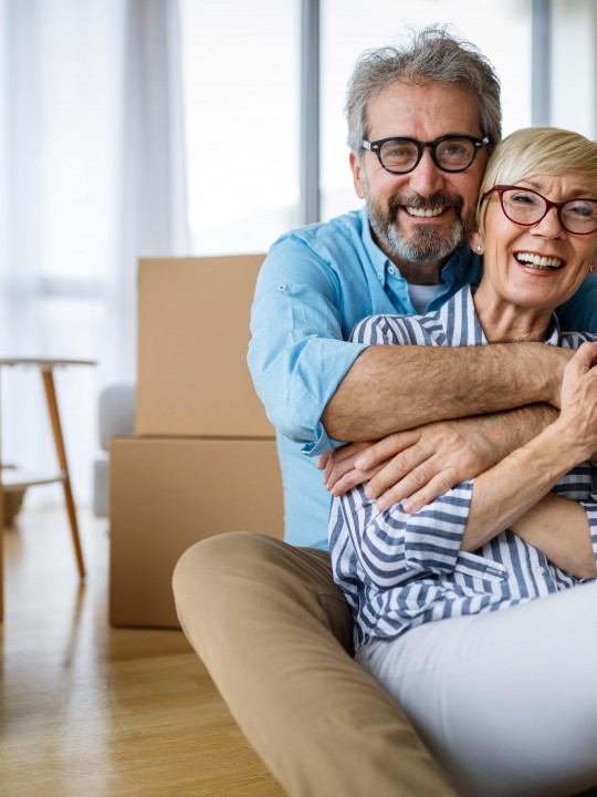 Couple Packing Boxes Moving Downsizing Clutter Removal Removalist